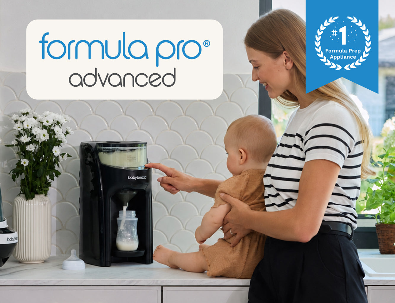 A woman in a kitchen holds a baby while using a black Formula Pro Advanced bottle dispenser. The scene includes promotional text overlays for 'formula pro advanced' and a blue 'number 1 formula prep appliance' badge.