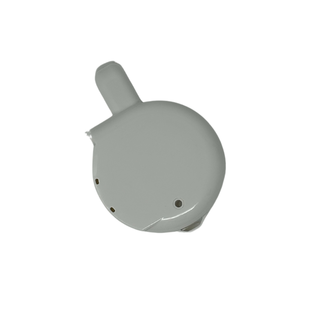 A small, round, white Food Maker Deluxe Replacement Bowl Lid by Baby Brezza UK, featuring a short tab and several visible ports or sensors, is pictured against a plain white background. - product thumbnail