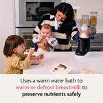 A woman uses the Baby Brezza UK Bottle & Breastmilk Warmer to gently warm a baby bottle as she holds her baby; nearby, a toddler enjoys cereal. Text below: Uses a warm water bath to safely preserve breastmilk nutrients while warming or defrosting. - product thumbnail