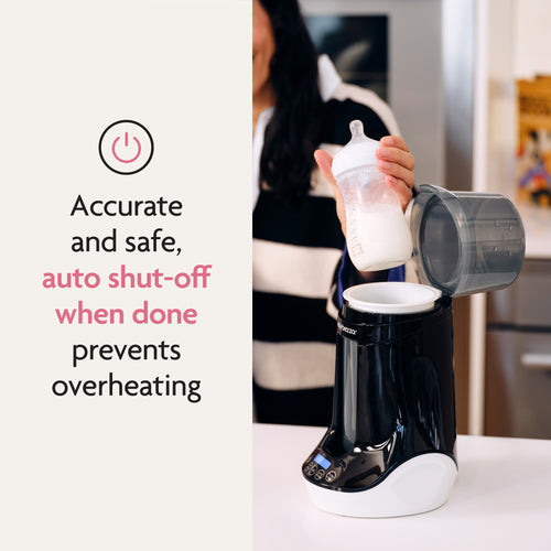 A person holds a bottle above a Baby Brezza UK Bottle & Breastmilk Warmer on a kitchen counter. Text highlights its precise, safe warming and auto shut-off to prevent overheating. - product thumbnail
