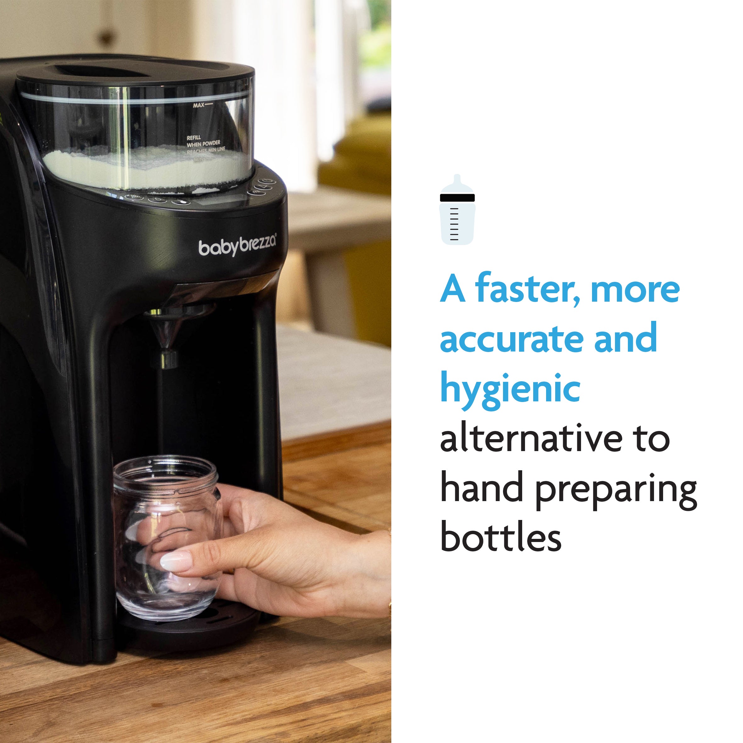 A hand holds a baby bottle under the Baby Brezza UK BUNDLE: Formula Pro Advanced + Extra Funnel & Cover Set on a wooden countertop. Text highlights its faster, more accurate, and hygienic formula prep with precise mixing technology. - product thumbnail