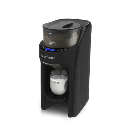 The Baby Brezza UK BUNDLE Formula Pro Advanced and SuperQuick Steriliser in all black dispenses formula into a baby bottle on its tray, and features a digital display and control buttons for easy use. - product thumbnail
