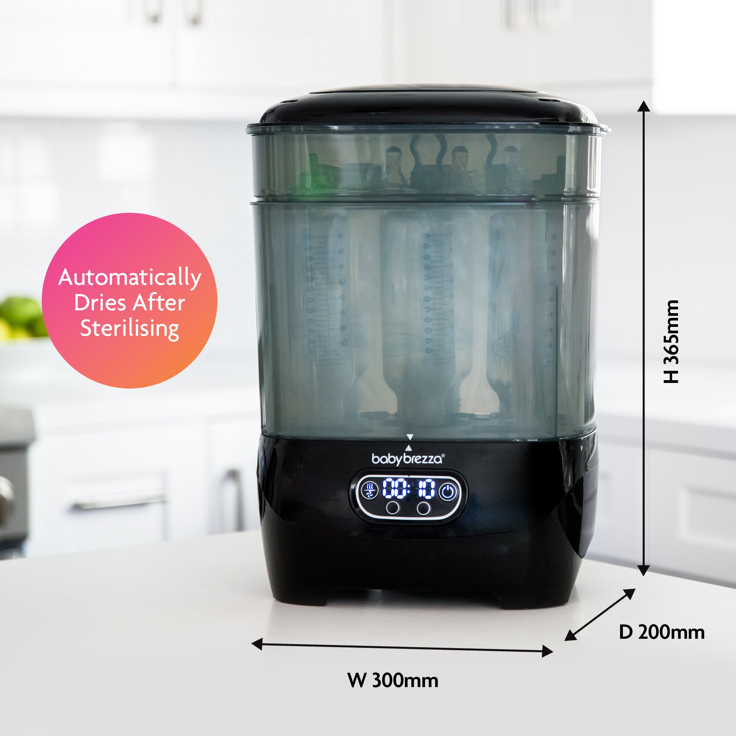 The Baby Brezza UK BESTSELLER BUNDLE: Formula Pro Advanced + Steriliser Dryer Advanced - All Black sits on a kitchen counter (300mm W x 200mm D x 365mm H); it automatically dries after sterilising and is perfect for effortless feeding. - product thumbnail