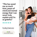 A smiling woman holds a baby and toddler in a kitchen by the Baby Brezza UK Steriliser Dryer Advanced. A testimonial praises its time-saving and peace of mind benefits, highlighted by a 4.4-star parent rating. - product thumbnail