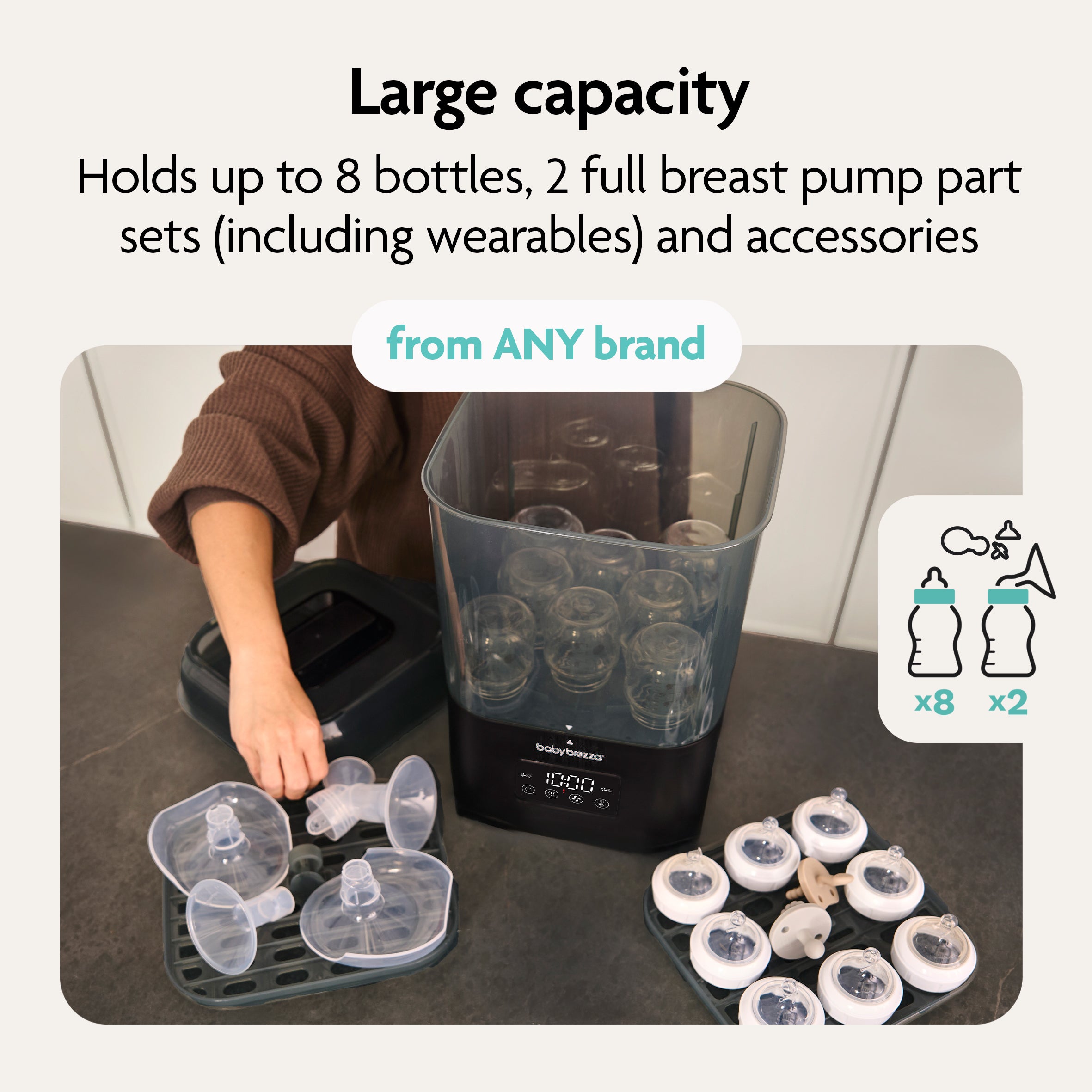 A parent loads the Baby Brezza SuperQuick Steriliser Dryer by Baby Brezza UK with up to eight bottles, two pump part sets, and accessories; illustrations and text emphasise its impressive capacity. - product thumbnail