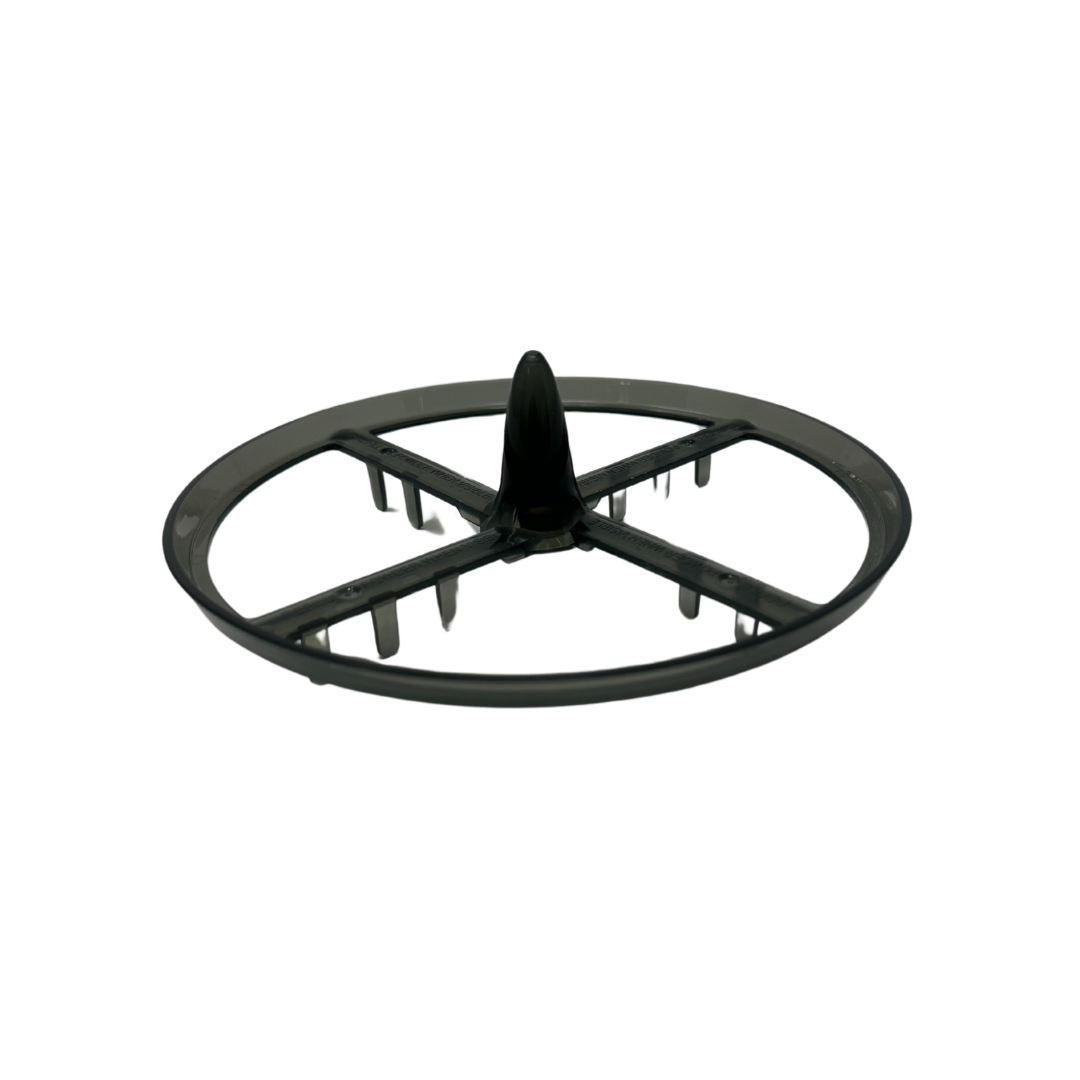 The Baby Brezza UK Replacement Stirring Wheel for Formula Pro Advanced Black is a circular plastic wheel with a central cone, four crossbars, and upright pegs, shown on a white background. - product thumbnail