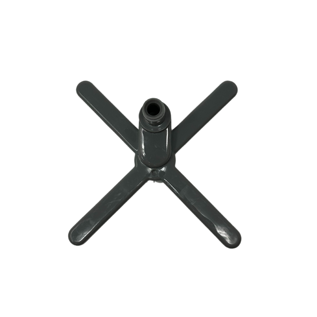 The Baby Brezza UK Bottle Washer Replacement Top Spray Arm is a dark gray, X-shaped plastic part with a central cylindrical attachment, shown on a white background. - product thumbnail
