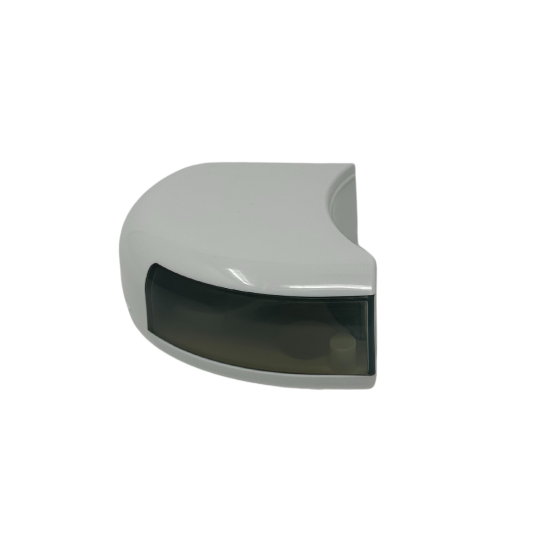 A white, wall-mounted motion sensor with a curved front and a dark, translucent cover on one side, echoing the sleek style of the Baby Brezza UK Food Maker Deluxe Replacement Water Tank, isolated on a white background. - product thumbnail