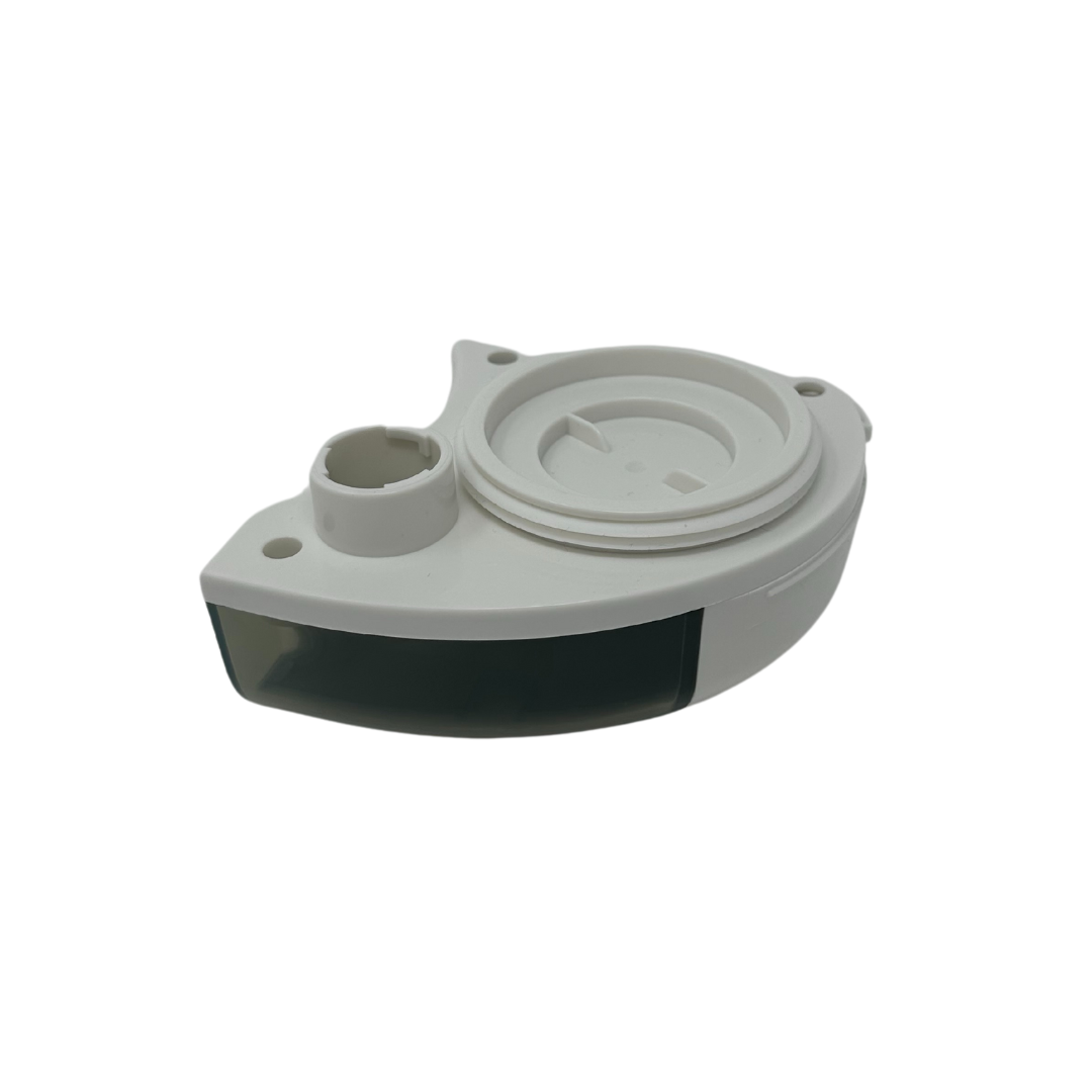 The Baby Brezza UK Food Maker Deluxe Replacement Water Tank is a white, oval-shaped plastic part featuring a circular indentation and a small cylindrical opening, displayed against a plain white background. - product thumbnail