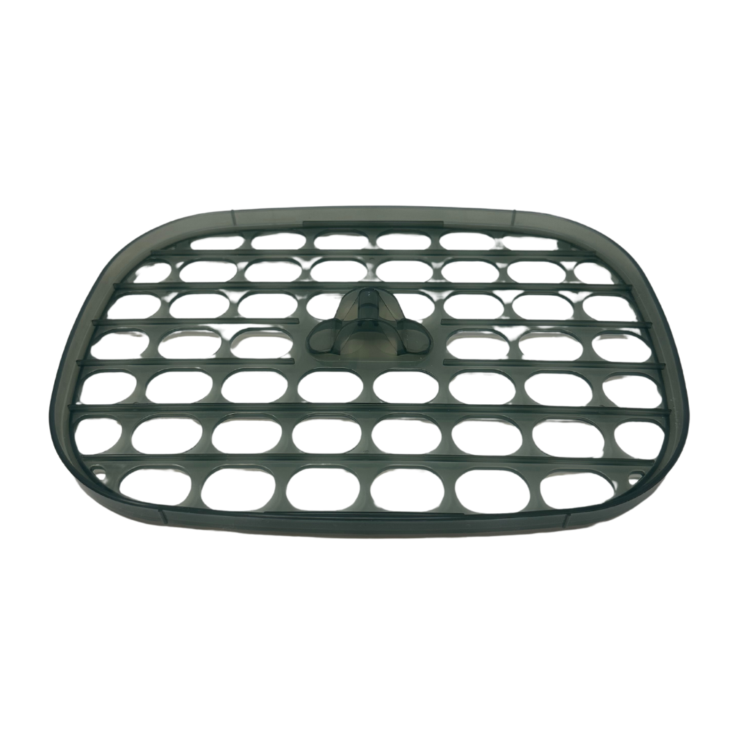 The Baby Brezza UK Steriliser Dryer Replacement Accessory Tray is a rectangular, dark green plastic tray with rounded corners, oval holes, and a central raised handle—designed for the Steriliser Dryer Advanced. - product thumbnail